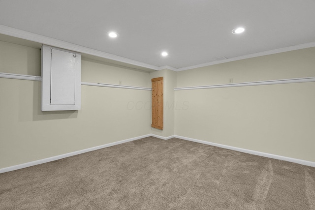 basement featuring carpet and ornamental molding