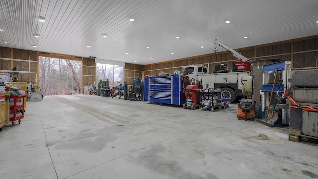 garage with wood walls