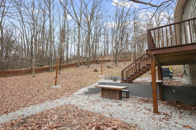 view of yard featuring a wooden deck