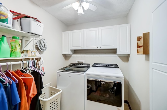 laundry area with ceiling fan, cabinets, independent washer and dryer, and a textured ceiling