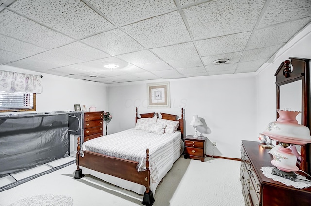 bedroom featuring a drop ceiling