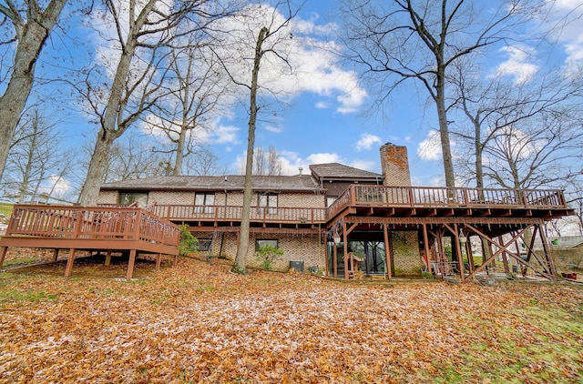 back of house featuring a deck