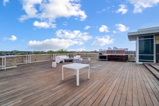 deck featuring an outdoor living space