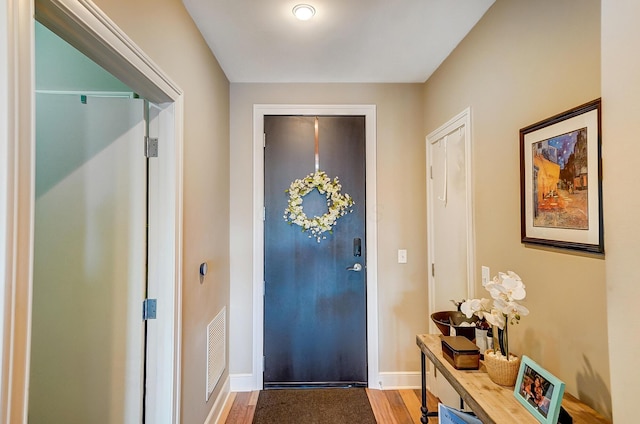 doorway to outside featuring hardwood / wood-style floors