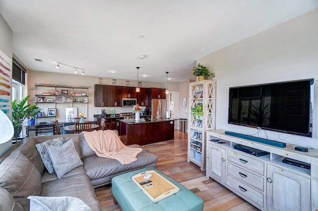 living room with light wood-type flooring