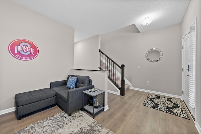 foyer entrance with light hardwood / wood-style floors