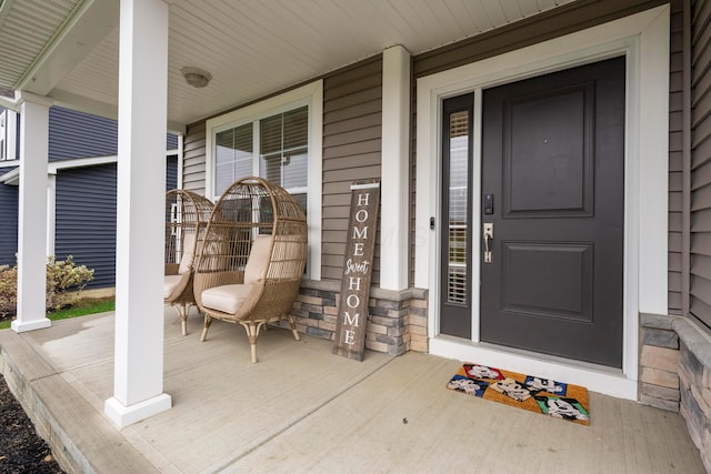 property entrance with a porch