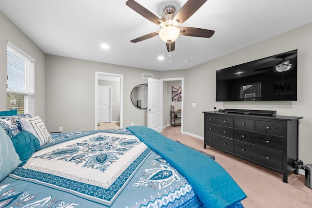 carpeted bedroom with ceiling fan