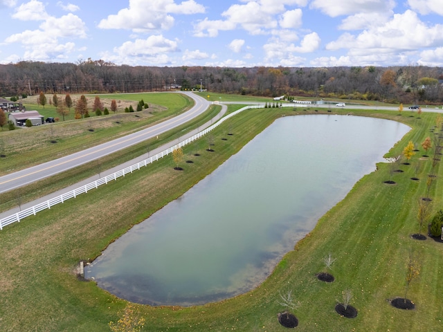 aerial view with a water view and a rural view