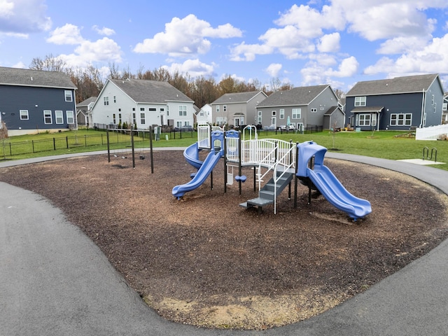 view of play area featuring a lawn