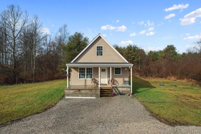 view of front of property with a porch and a front yard