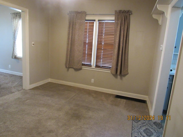 view of carpeted spare room