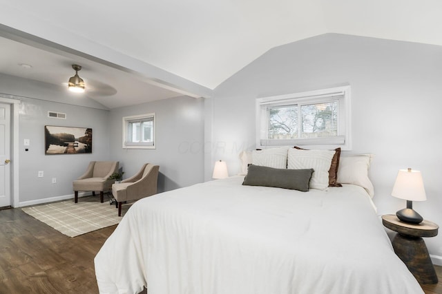 bedroom featuring lofted ceiling, ceiling fan, and dark wood-type flooring