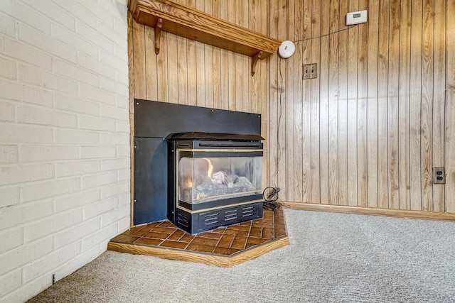 details with carpet and wooden walls