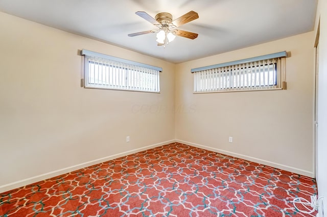 unfurnished room featuring ceiling fan