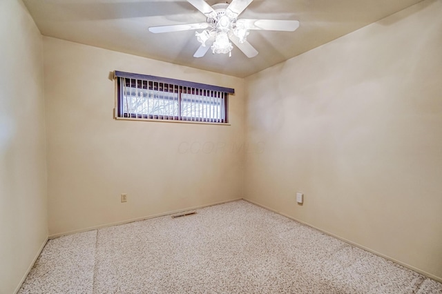 spare room featuring ceiling fan