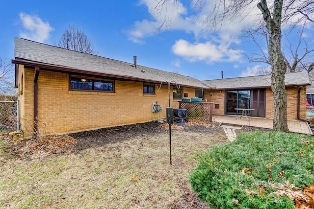 back of property featuring a patio area