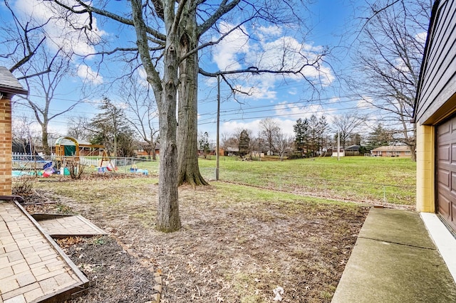 view of yard featuring a playground