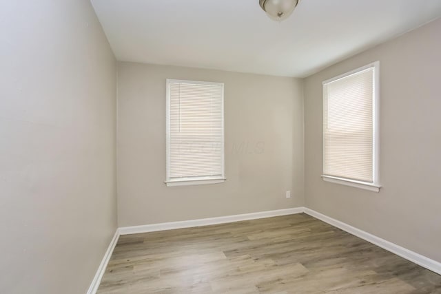 empty room featuring light hardwood / wood-style floors