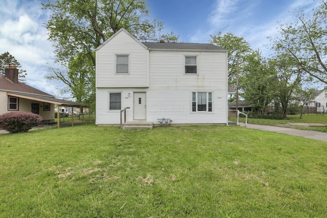 view of front of home with a front lawn