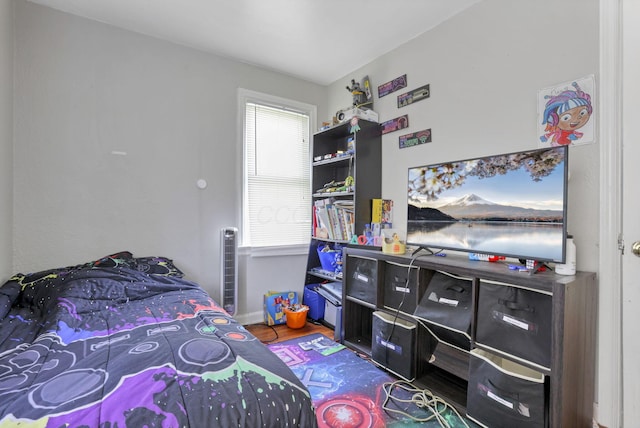 bedroom featuring hardwood / wood-style flooring