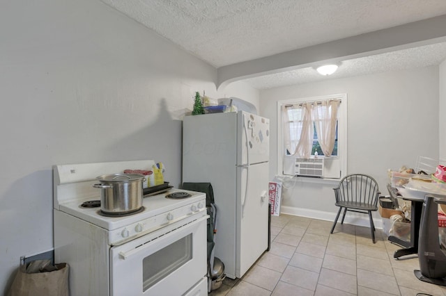 kitchen with cooling unit, white appliances, a textured ceiling, and light tile patterned floors