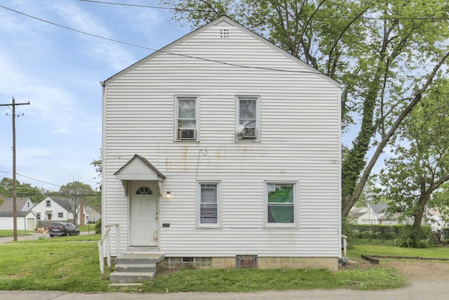 view of front facade featuring a front lawn