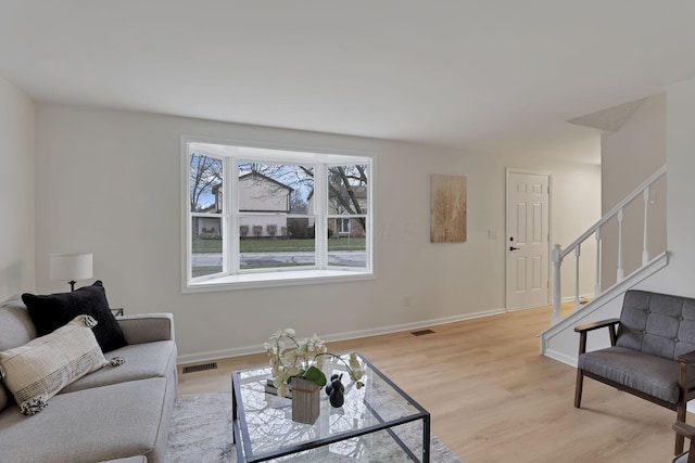 living room featuring light wood-type flooring