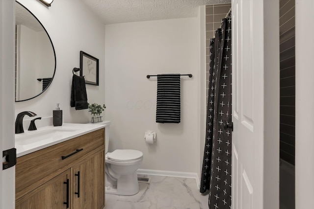 bathroom with vanity, a shower with curtain, a textured ceiling, and toilet