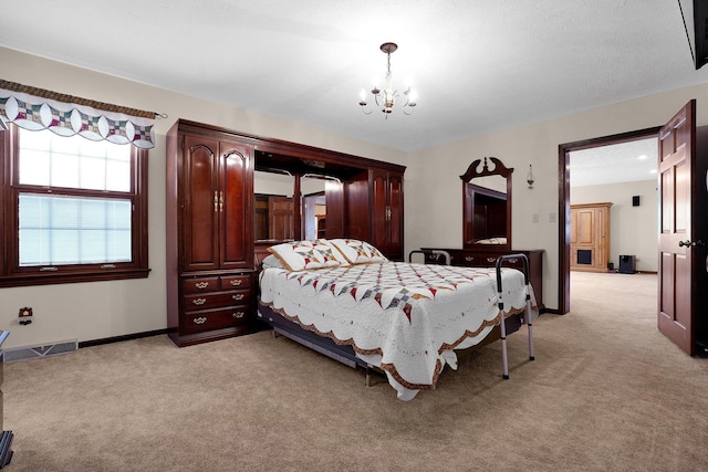 carpeted bedroom with a notable chandelier