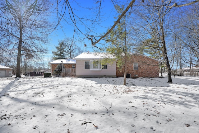 view of snow covered house