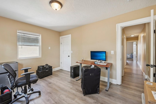 office area featuring light hardwood / wood-style floors