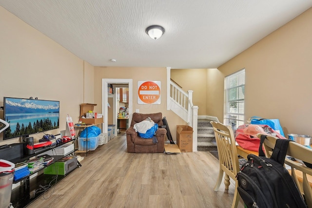 rec room featuring light hardwood / wood-style floors