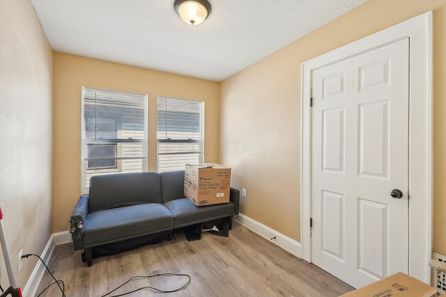 living area featuring light wood-type flooring