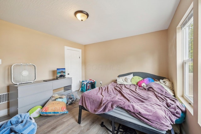 bedroom featuring light hardwood / wood-style flooring