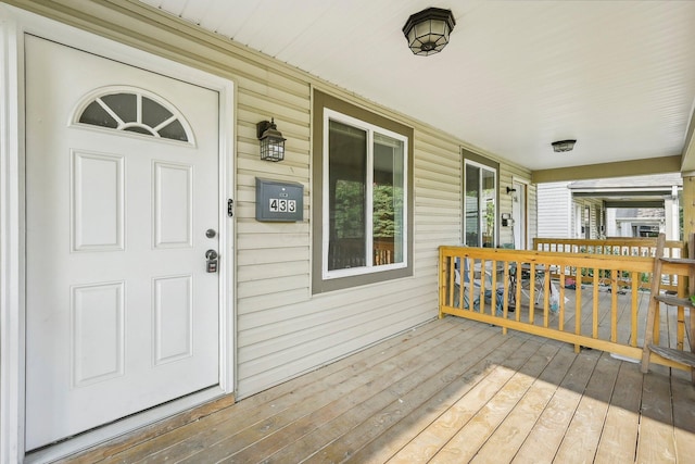 entrance to property with covered porch