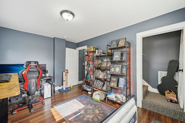 office area with dark hardwood / wood-style flooring