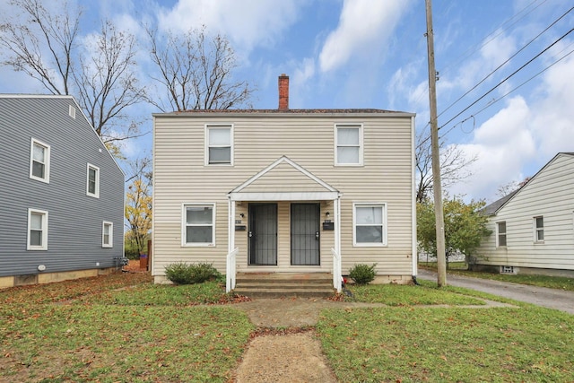 view of front of property with a front yard