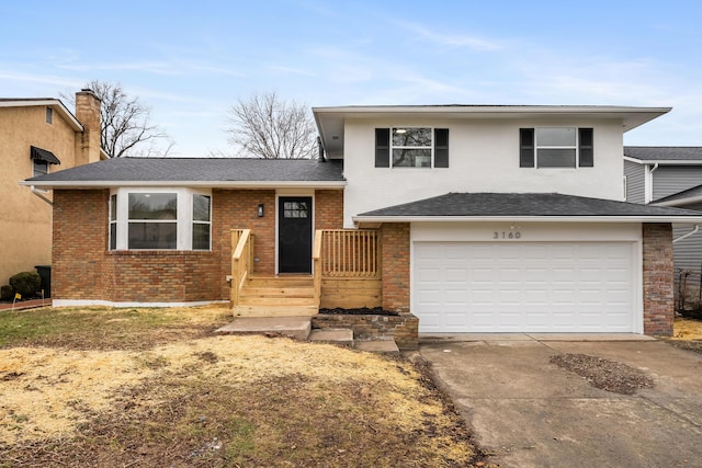 split level home featuring a garage