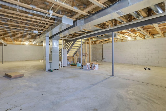 basement with gas water heater and heating unit