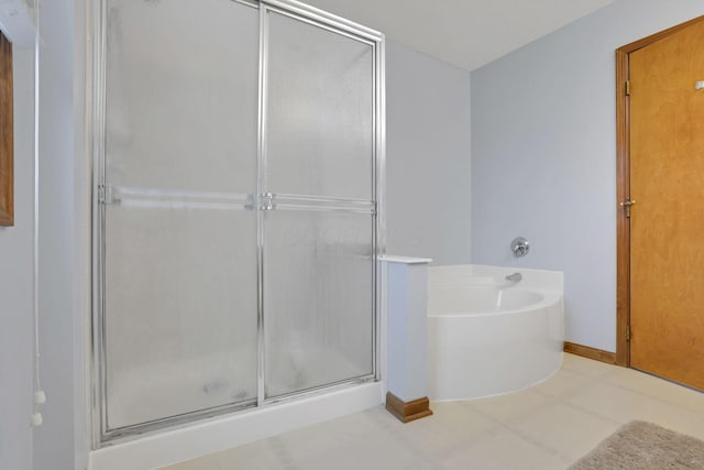 bathroom with independent shower and bath