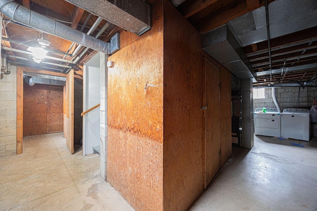 basement with washing machine and clothes dryer