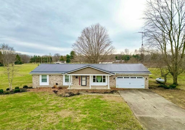 ranch-style home featuring a front lawn, a porch, and a garage