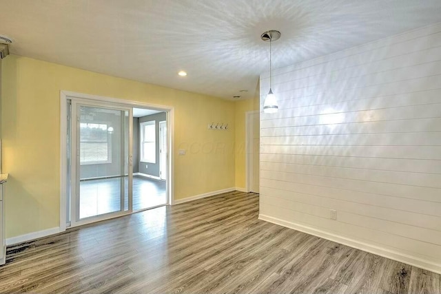 empty room featuring hardwood / wood-style flooring