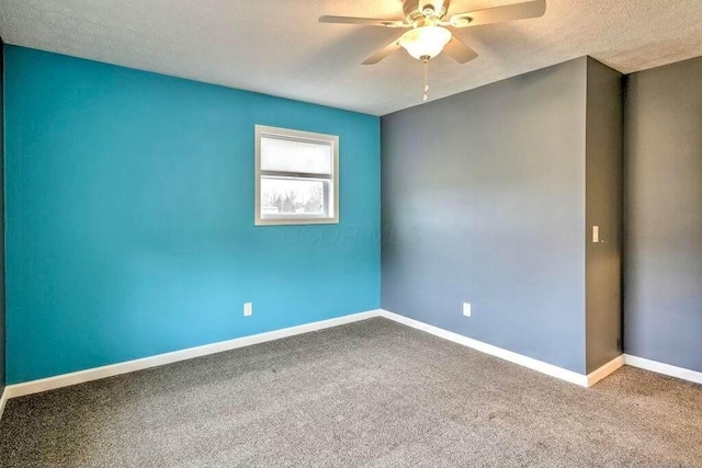 empty room with carpet, a textured ceiling, and ceiling fan