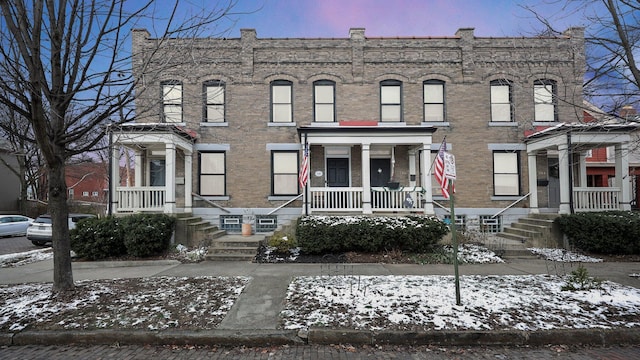 view of property with a porch