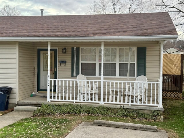 property entrance with covered porch