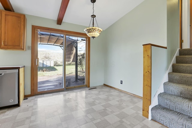 interior space featuring beamed ceiling