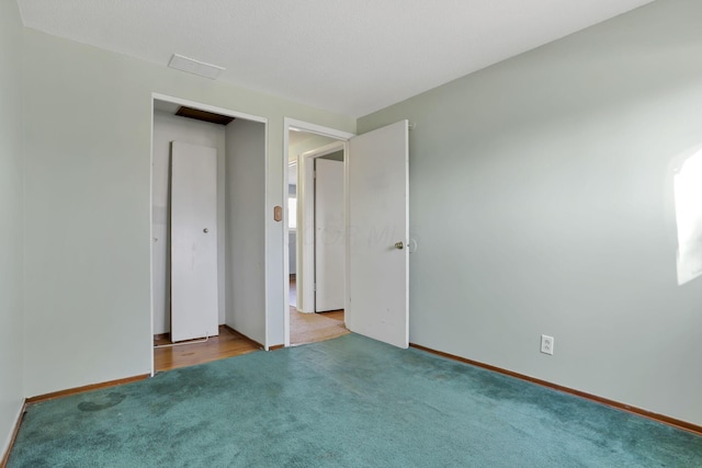 unfurnished bedroom with light carpet