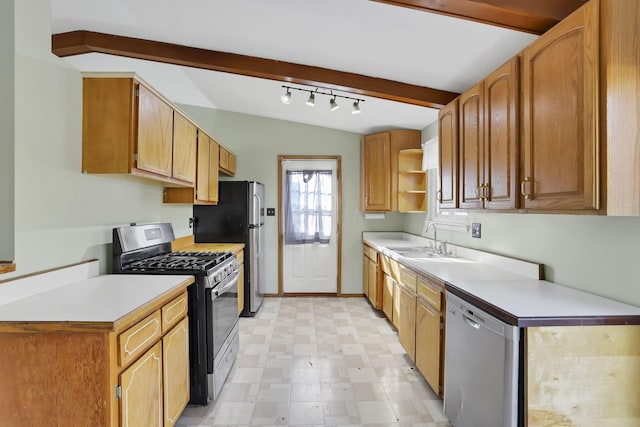 kitchen featuring vaulted ceiling with beams, sink, and appliances with stainless steel finishes